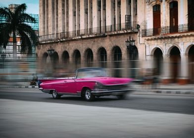Pink Cadillac on street