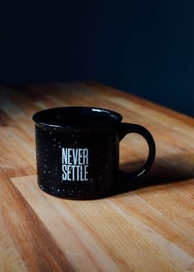 Never settle cup