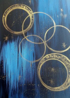 Golden rings on black blue