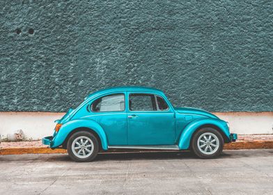 teal Volkswagen Beetle car