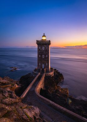 a lighthouse on a rocky