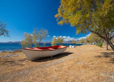 Fishing boat on sea shore