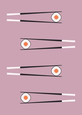 Chopsticks and sushi rolls