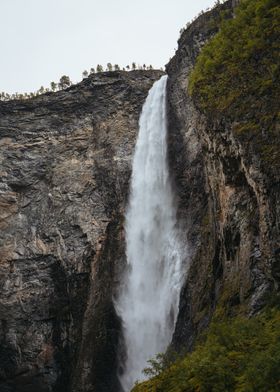 Waterfall in Mountainous Landscape