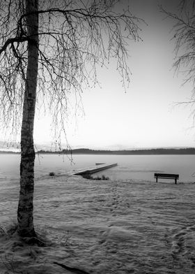 Old Pier And A Bench