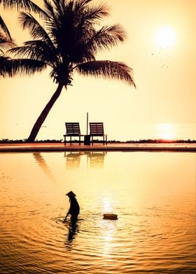 Vietnamese silhouette fisherman sunset pool