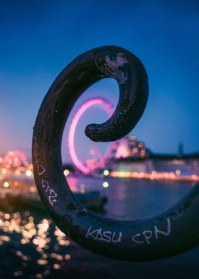 London Eye Through a Railing Bokeh Lights