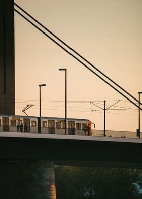 Train on Bridge at Sunset