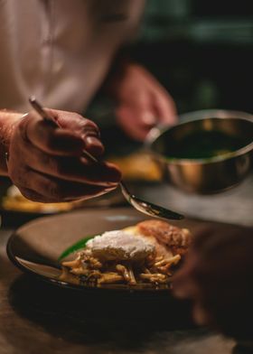 Chef Finishing Dish