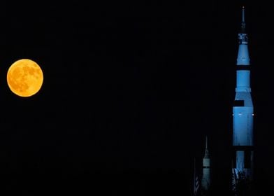 Saturn V Rocket Under Full Moon