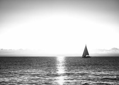 Sailboat on Calm Sea sunset landscape