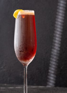 Kir Royale Cocktail garnished with lemon zest twist