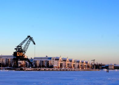 Frozen Harbor with Crane