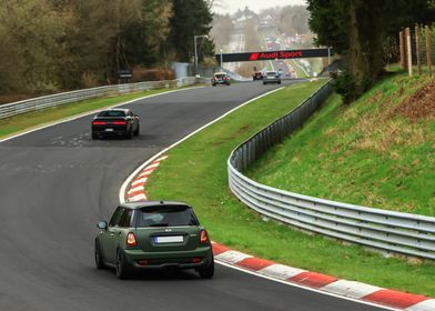 Green Mini Cooper on the Nordschleife