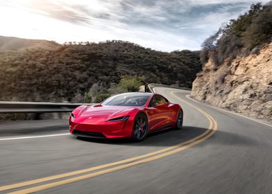 Red Tesla Roadster on Winding Road