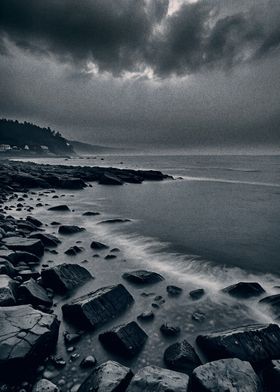 Rocky Coastline Under Stormy Skies