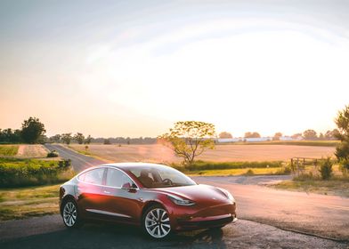 Red Tesla on Country Road