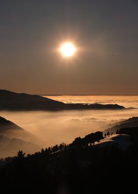 Sunrise Over Foggy Mountains