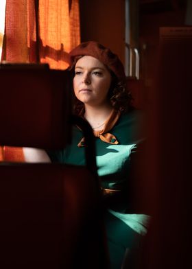 Woman in Green Dress on old Train