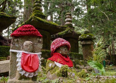 Stone Statues in Forest