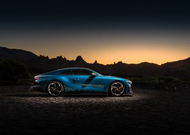 Blue Sports Car at Sunset