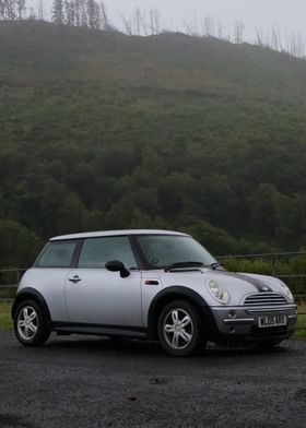 Silver Mini Cooper in Foggy Forest