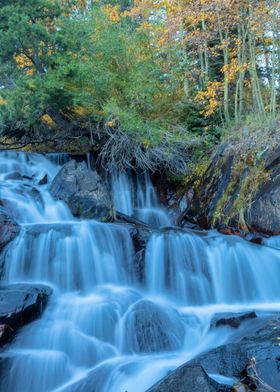 Waterfall in Autumn Forest