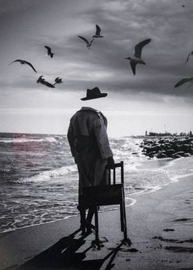 What We Choose to Drag – Surreal Monochrome Artwork of a Headless Man on the Beach with Birds