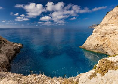 Coastal Cliffs and Azure Sea in Greek Island