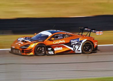 Orange Race Car on Track