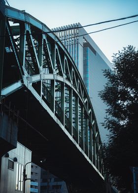 Steel Bridge Over Cityscape Tokyo