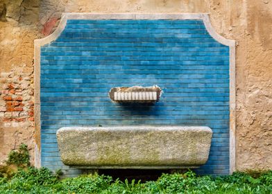 Stone Fountain with Blue Tiles