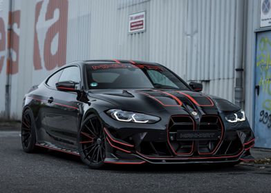 Black BMW M4 with Red Acce