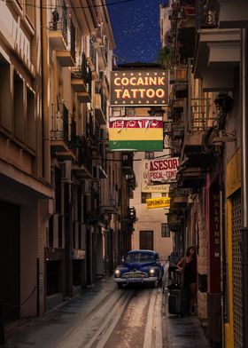 Nighttime Alleyway with Classic Car