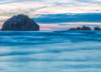 Ocean Sunset with Rock Formations