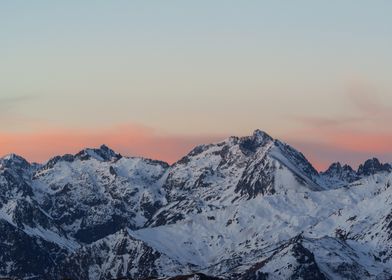 Snowy Mountain and sunrise in Pyrenees 