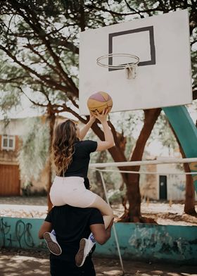 Couple Playing Basketball