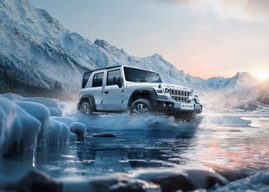 Silver SUV in Snowy Mountains