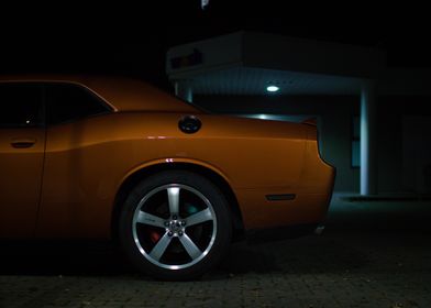 Orange Dodge Challenger at Night