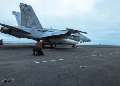 Military F/A-18 Super Hornet on Aircraft Carrier