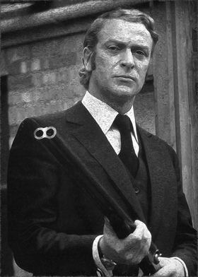 Get Carter  in Suit Holding Shotgun