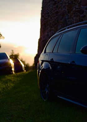 Blue BMW Wagon at Sunset