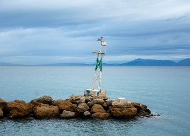 Lighthouse on Rocky Outcrop