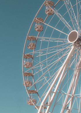 Ferris Wheel Against Blue Sky