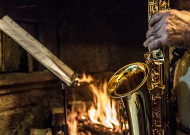 Saxophone by the Fireplace