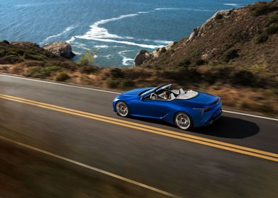 Blue Lexus Convertible on Coastal Road