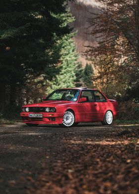 Red BMW E30 in Forest