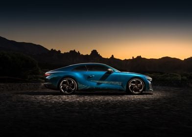 Blue Sports Car at Sunset