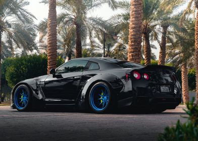 Black Nissan GTR with Blue Rims