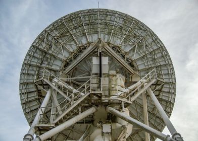 Satellite Dish Under Cloudy Sky